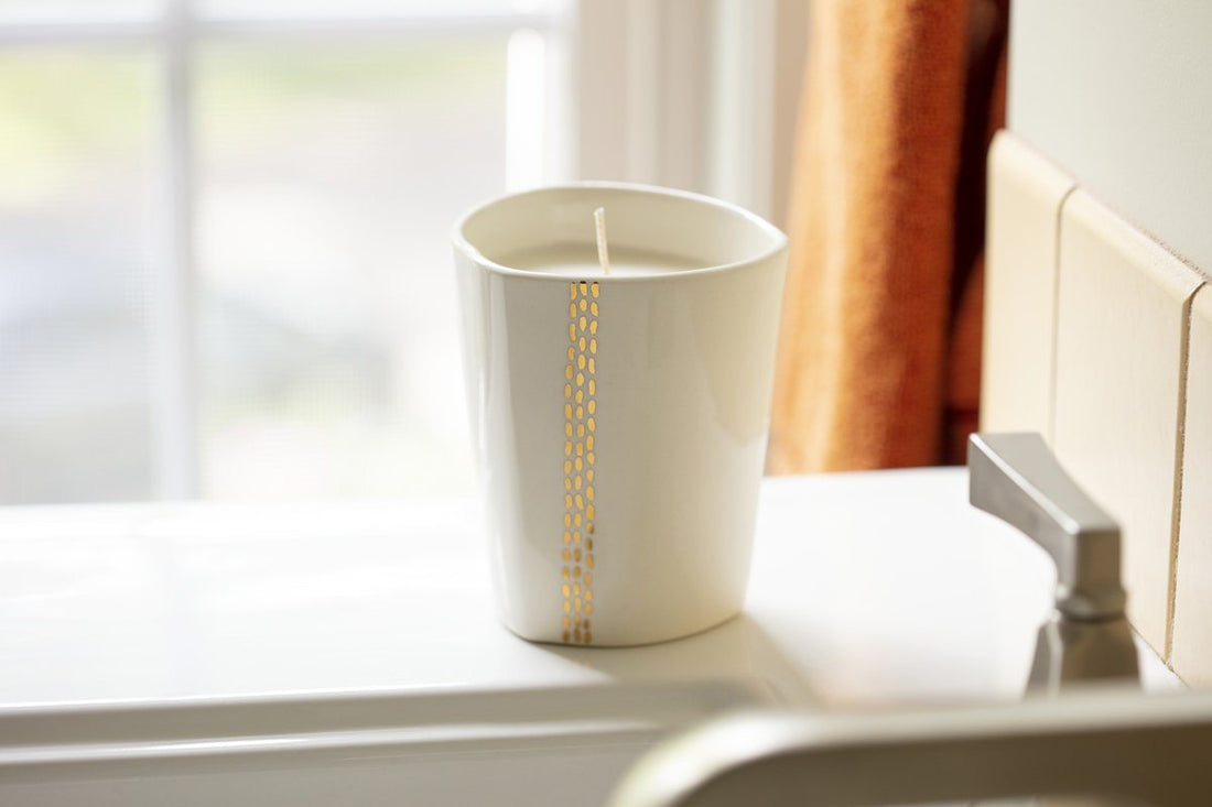 Linnea Gold Candle - handcrafted by Tandem Ceramics and handpoured at Prosperity Candle. Meaningful gift that gives back.
