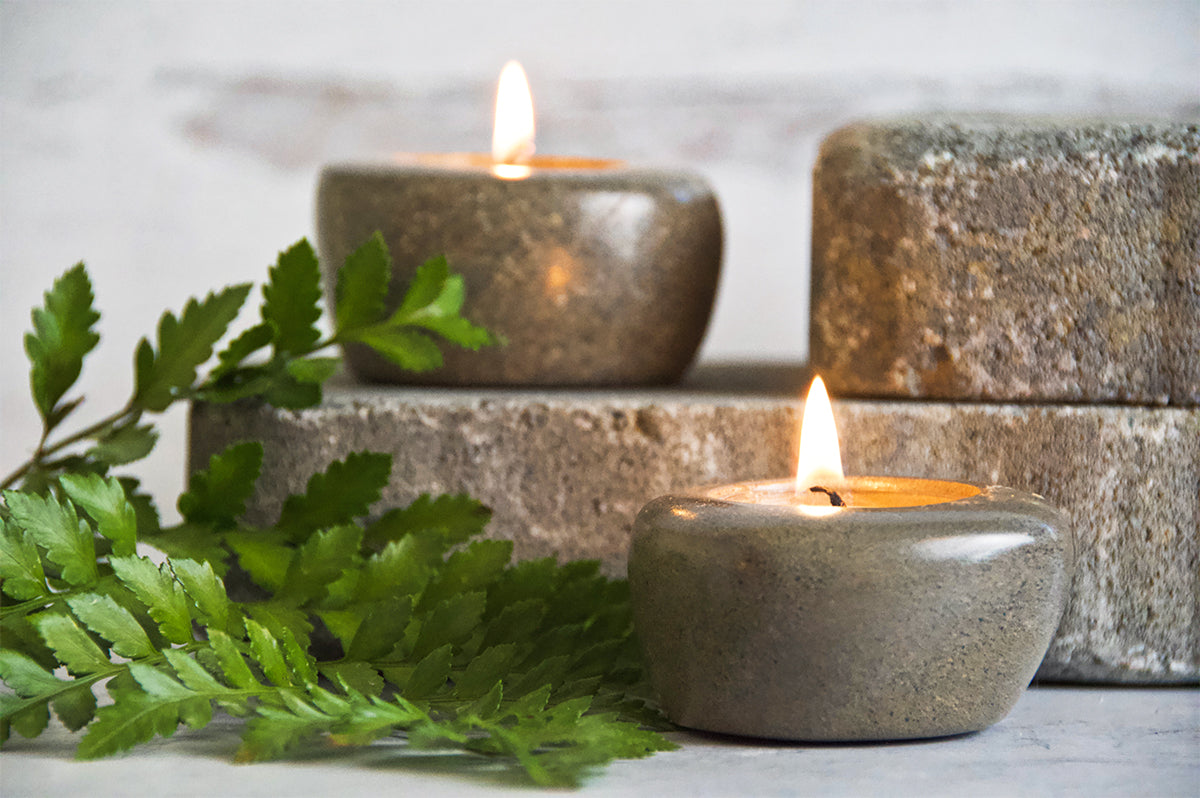 Riverstone tea light holders with Haitian beeswax tea lights.